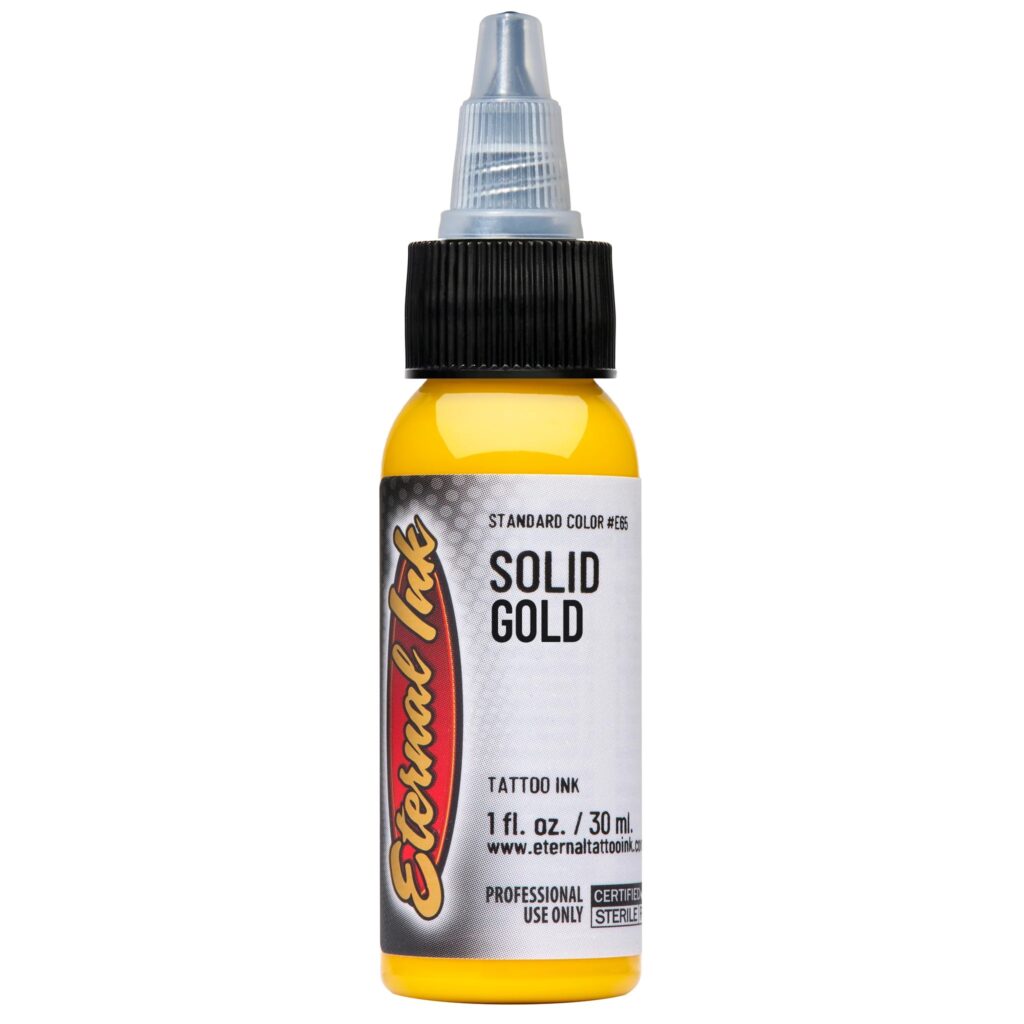 muc-xam-eternal-chinh-hang-mau-solid-gold- Mực xăm Eternal Solid Gold chính hãng là tông vàng gold đậm nổi bật, phù hợp cho tattoo màu, phối màu kim loại, trang sức, giáp, rồng, rắn, Nhật cổ, old school, neo traditional và các thiết kế cần sắc vàng chắc, rõ và có chiều sâu.