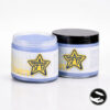 Hai hũ BraveStar Tattoo Ointment 280g, một hũ mở nắp và một hũ đậy nắp đen